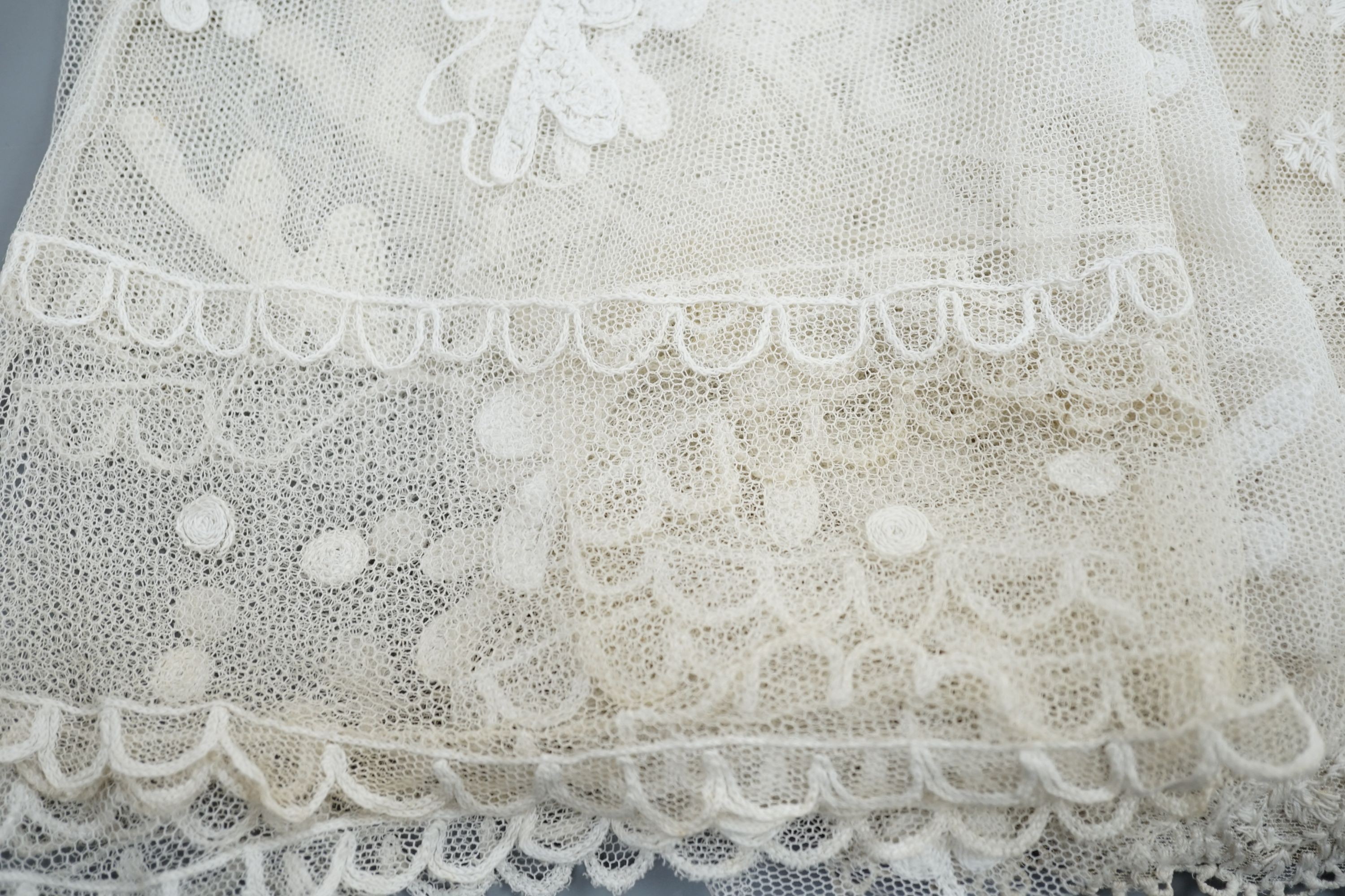 A needle lace skirt panel, a similar stole, various machine laces and trimmings